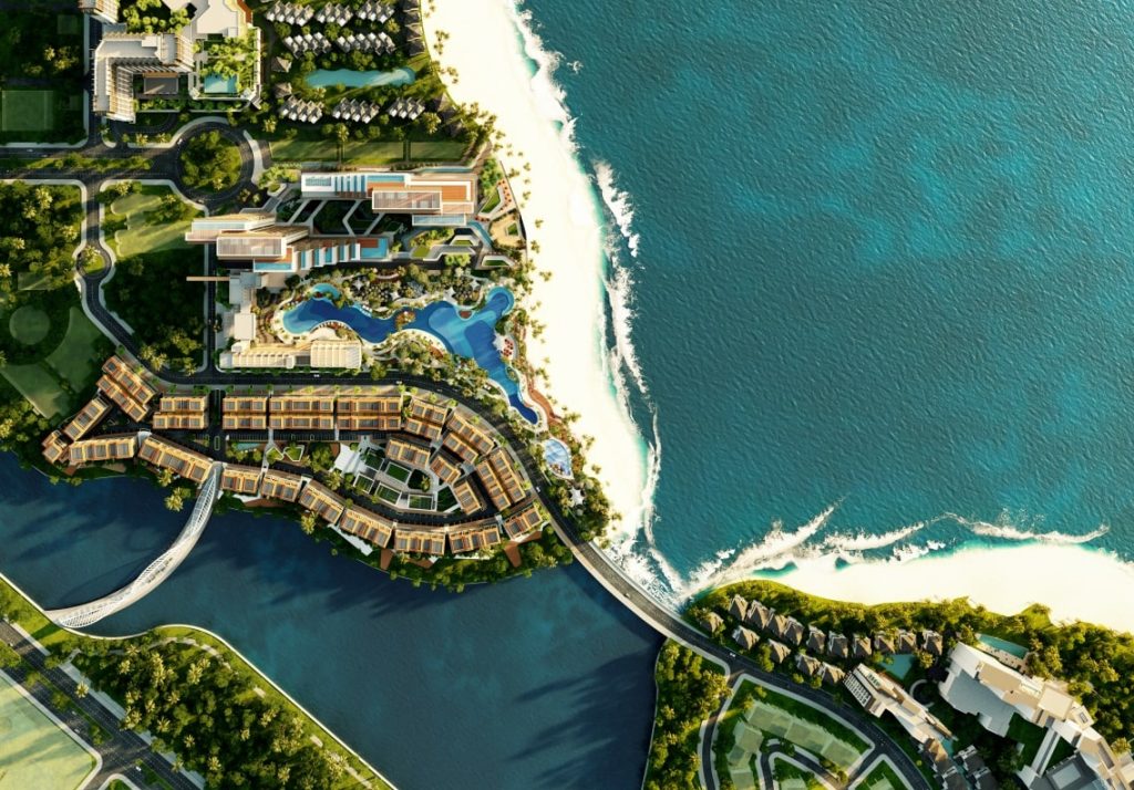 Phối cảnh nhìn từ trên cao dự án Imperia Holiday tại Marina Bayfront District Hạ Long, nổi bật với khu nghỉ dưỡng, hồ bơi lớn, dãy biệt thự hướng biển và không gian xanh liền kề bãi biển riêng.